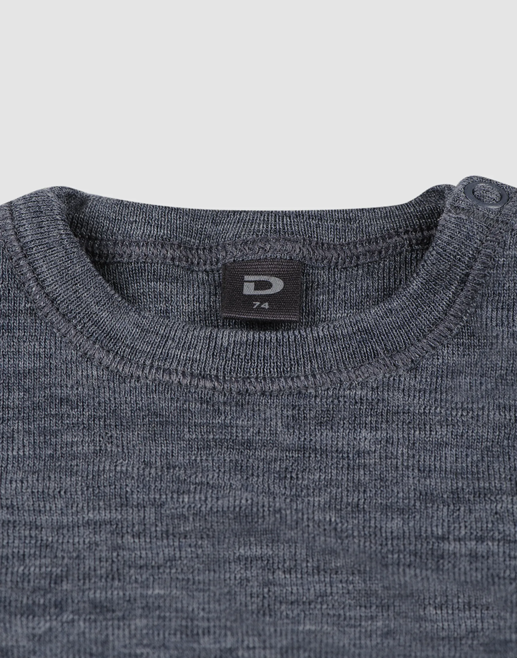 Bluse i merinould til baby