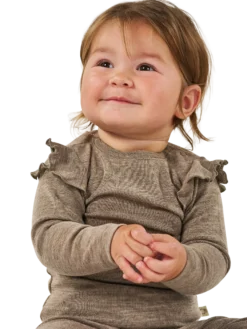 Bluse i merinould til baby