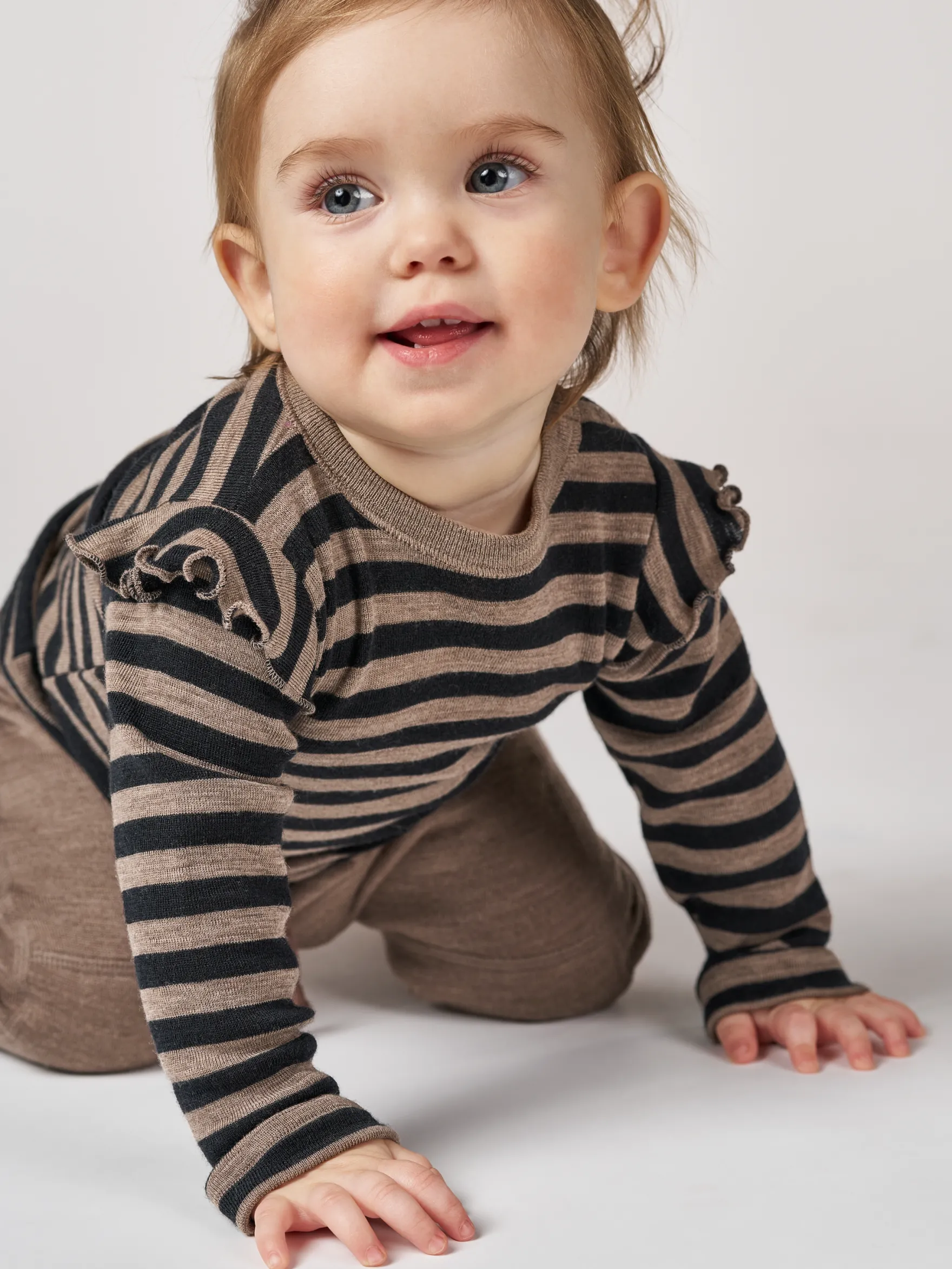 Bluse i merinould til baby