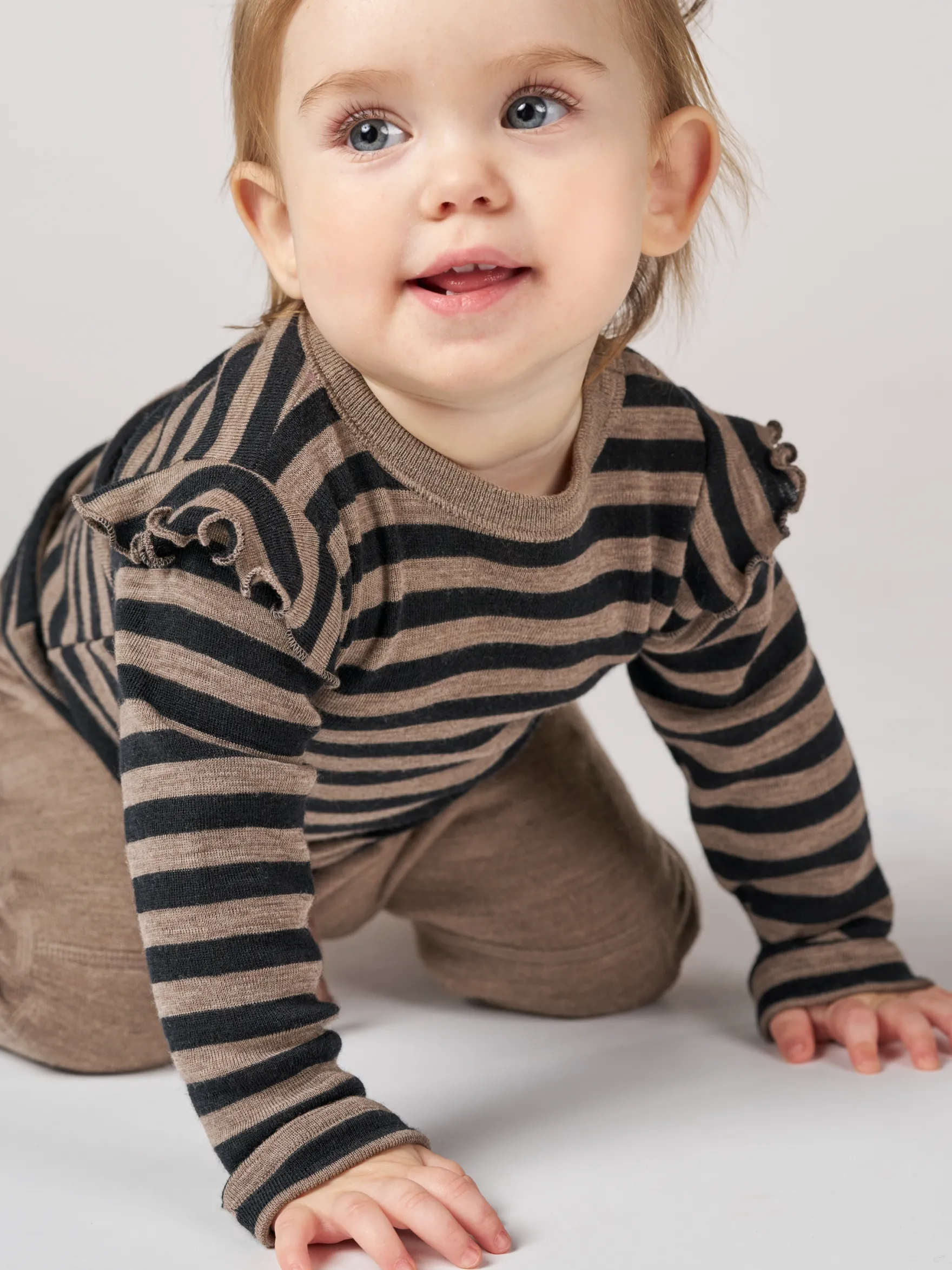 Bluse i merinould til baby