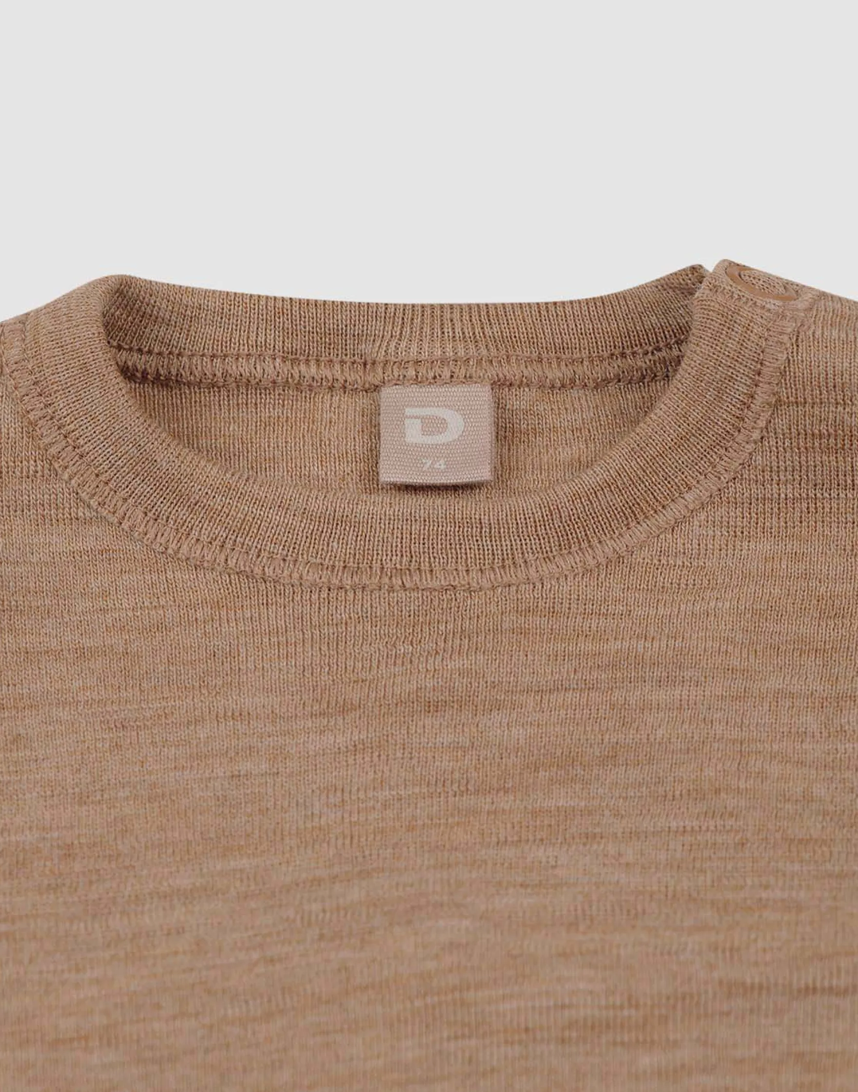 Bluse i merinould til baby