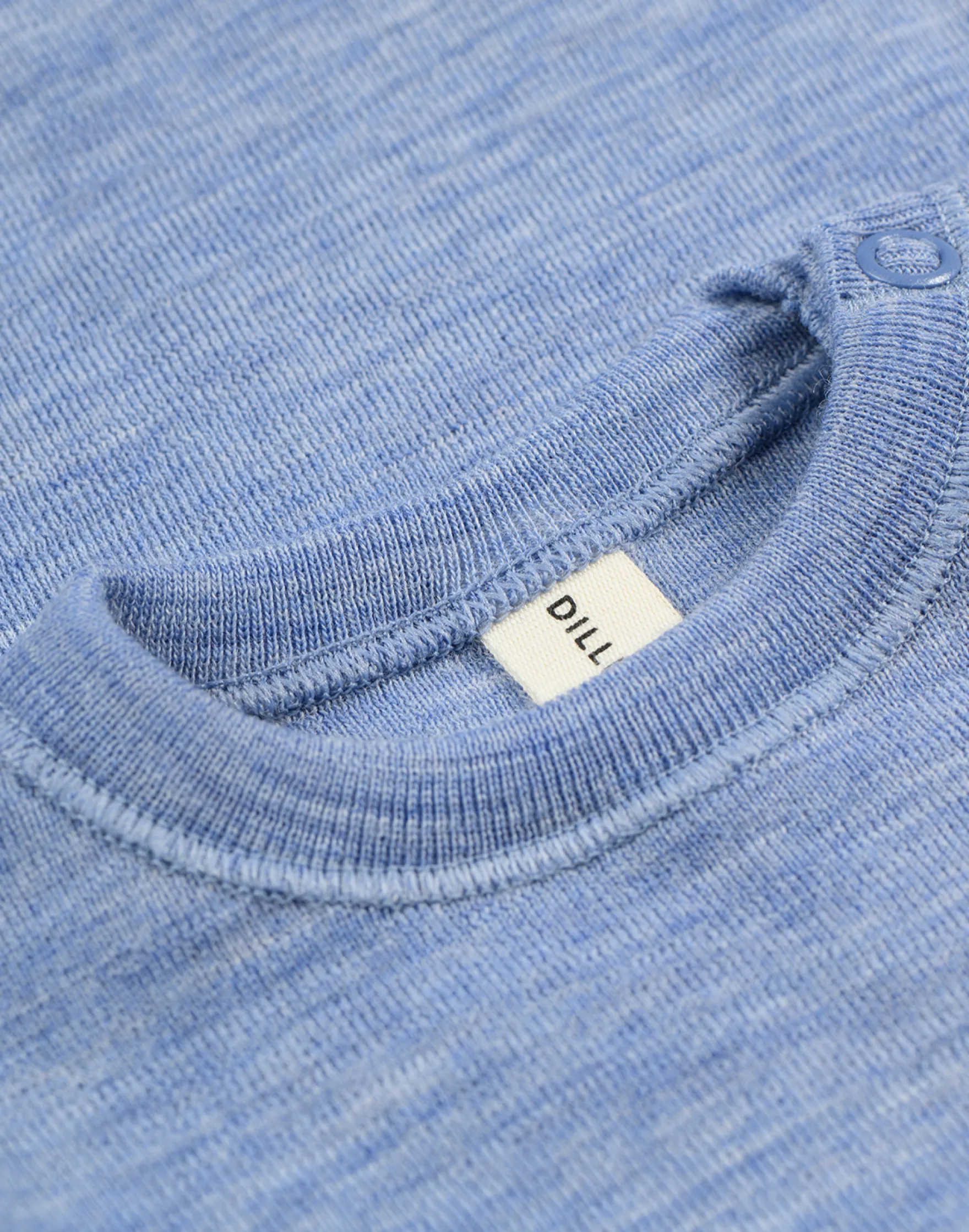 Bluse i merinould til baby