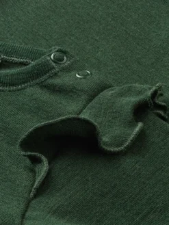 Bluse i merinould til baby