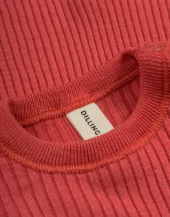 Bluse med flæser i merinould til baby