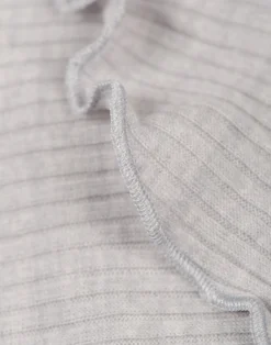 Bluse med flæser i merinould til børn