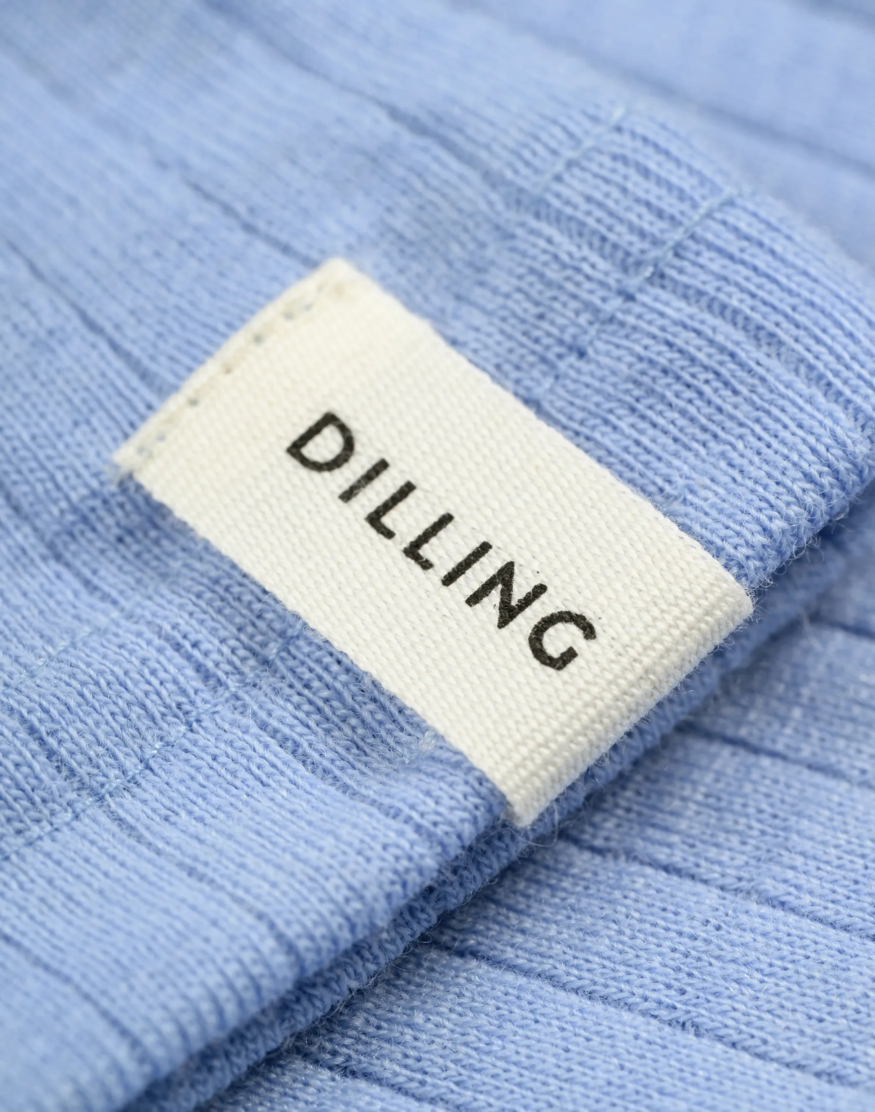 Bluse med høj hals i merinould til kvinder