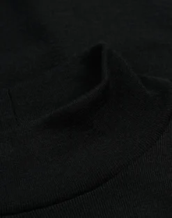 Bluse med høj hals i merinould til kvinder