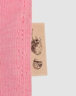 Bluse med hulmønster i merinould/silke til baby