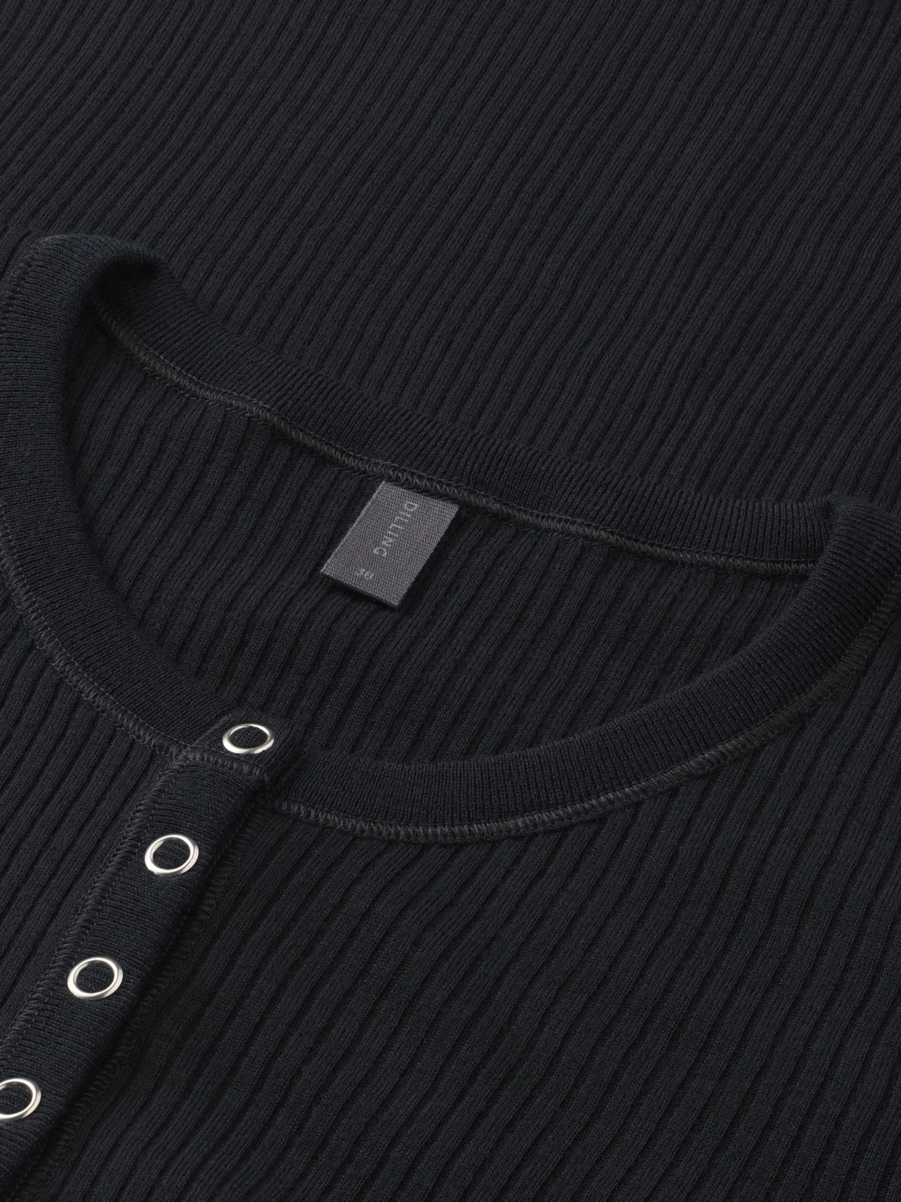 Bluse med knapper i merinould til kvinder