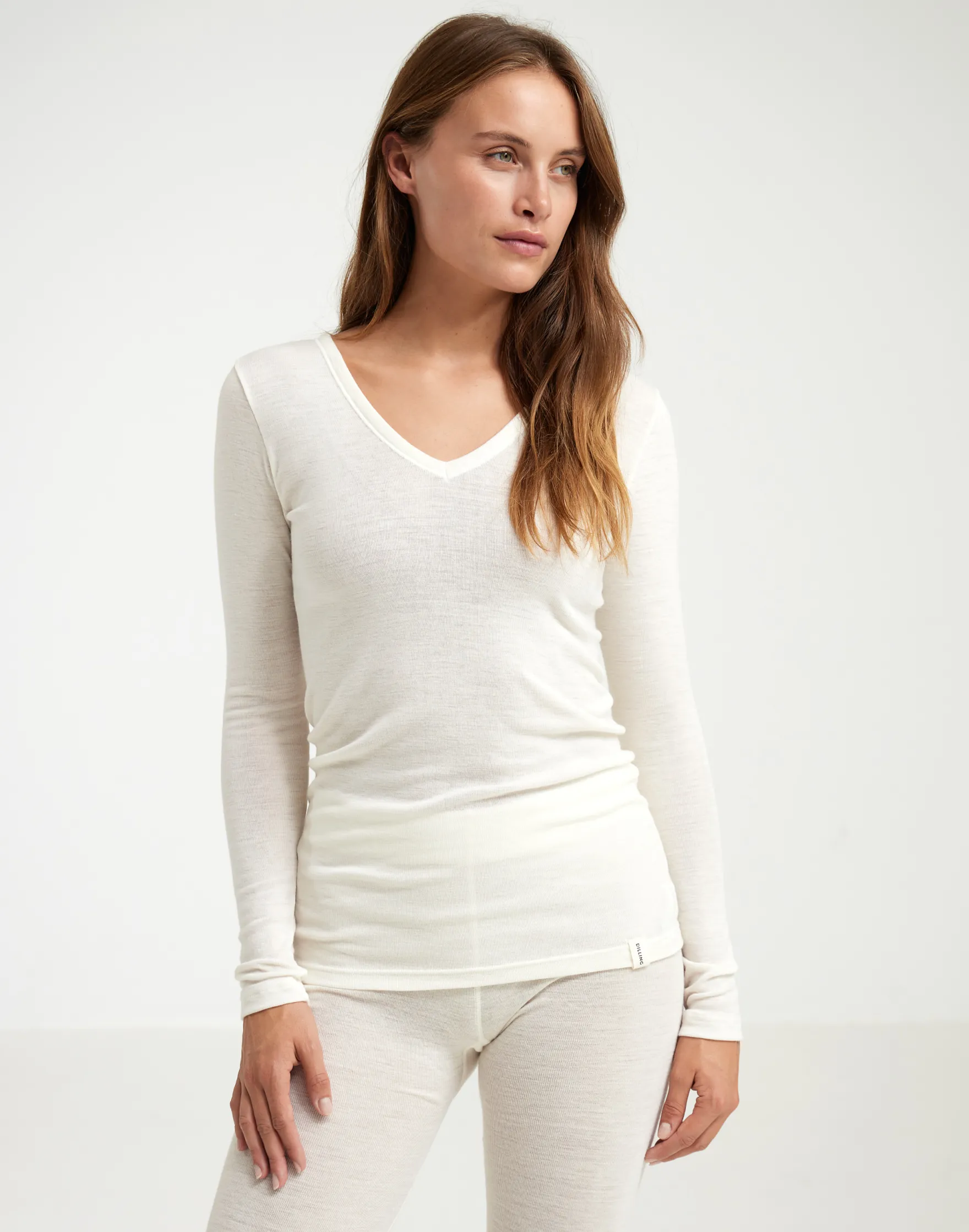 Bluse med V-hals i merinould til kvinder