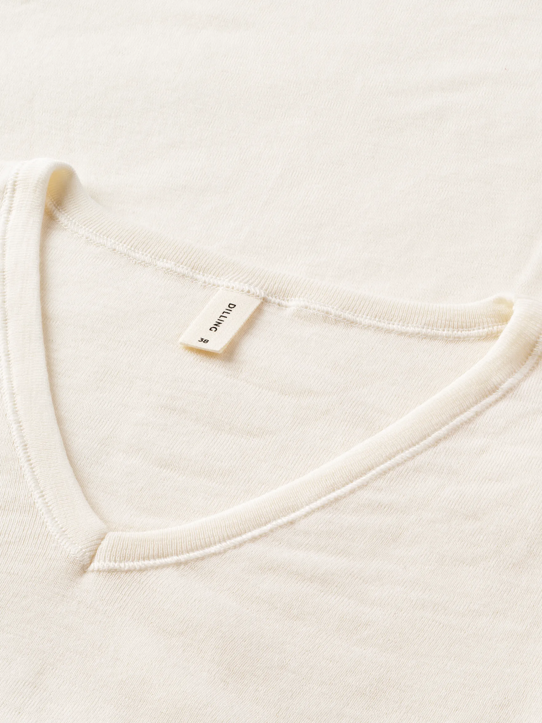 Bluse med V-hals i merinould til kvinder