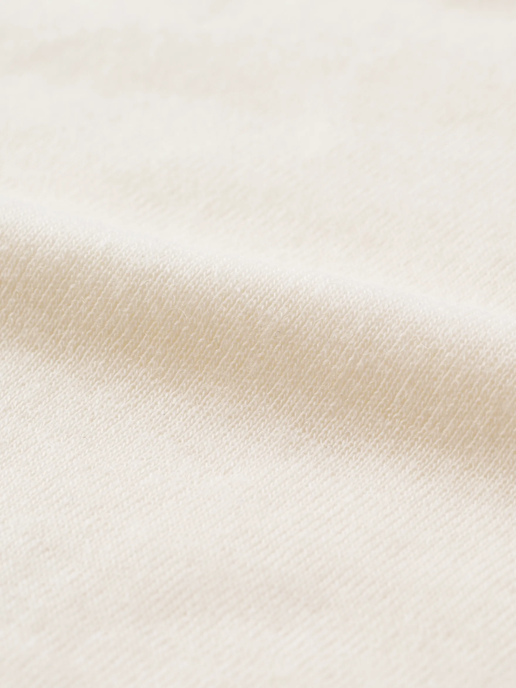 Bluse med V-hals i merinould til kvinder