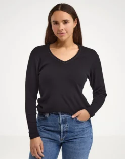 Bluse med V-hals i merinould til kvinder