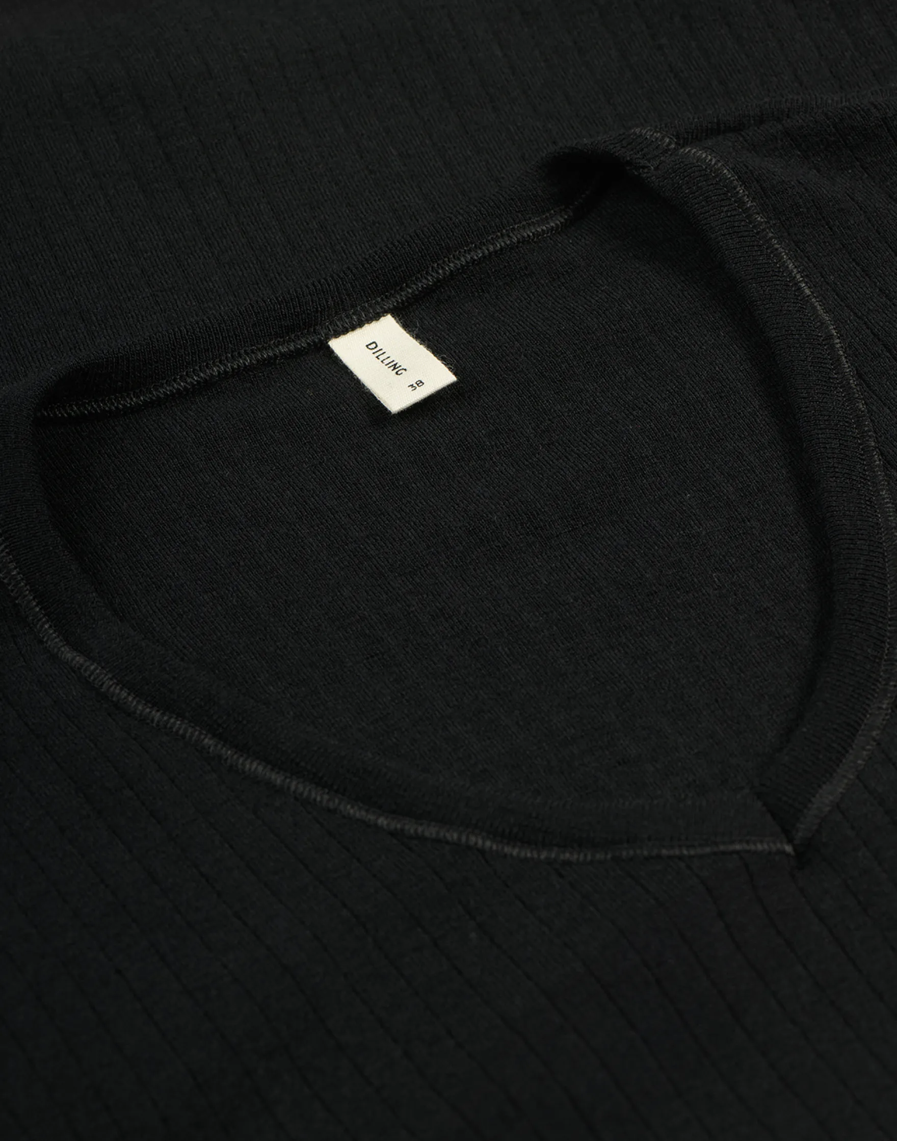 Bluse med V-hals i merinould til kvinder