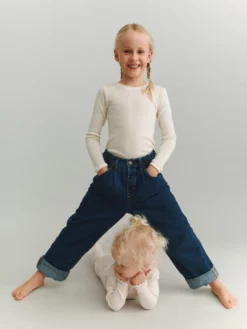 Body i merinould med hulmønster til baby