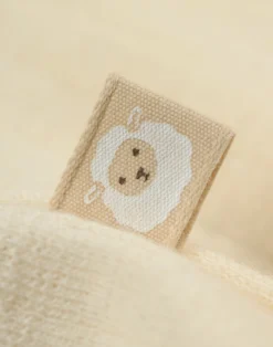 Body med lange ærmer i merinould til baby