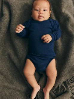 Body med lange ærmer i merinould til baby