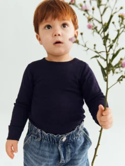 Body med lange ærmer i merinould/silke til baby