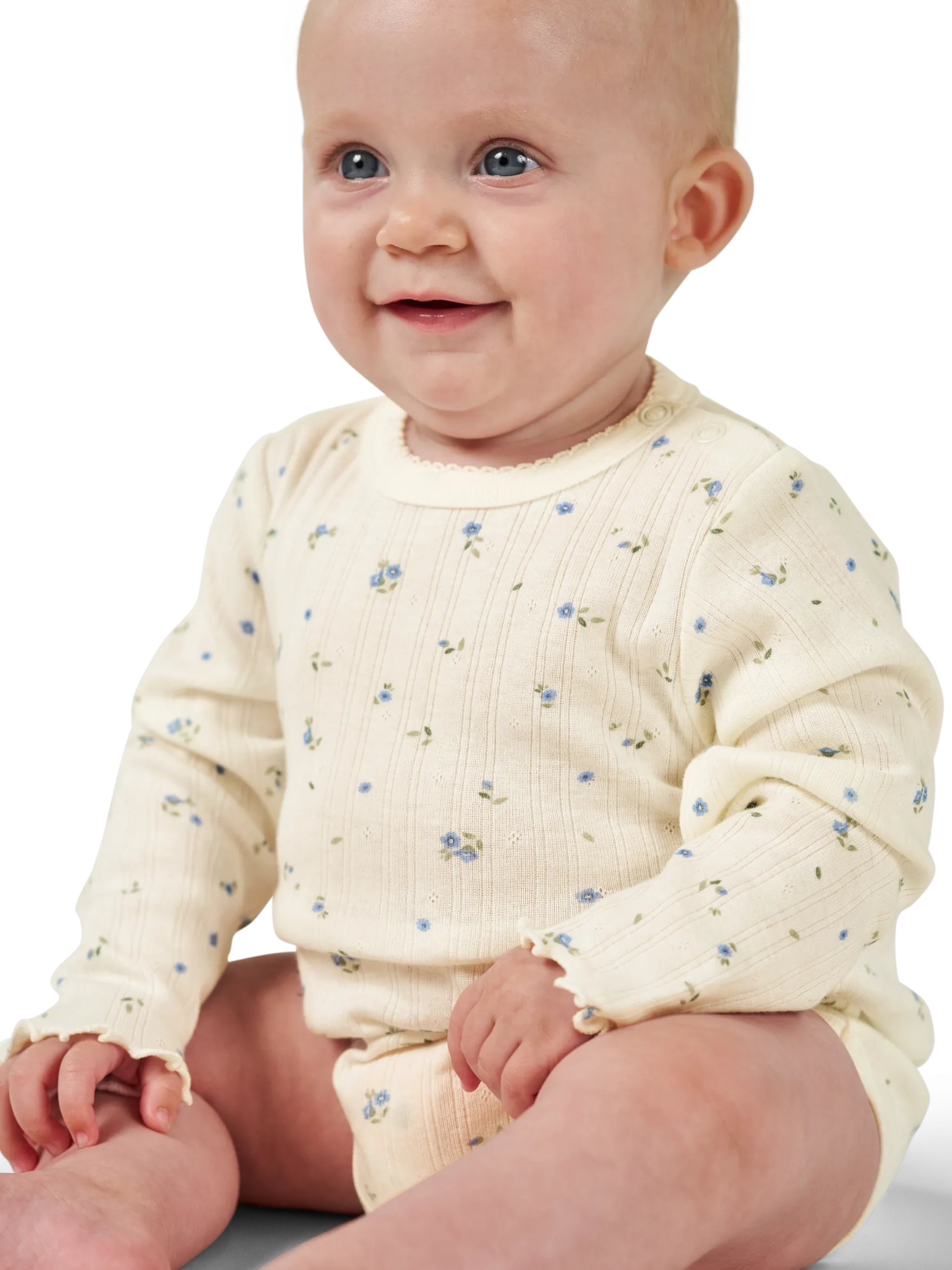 Body med lange ærmer med hulmønster i bomuld til baby