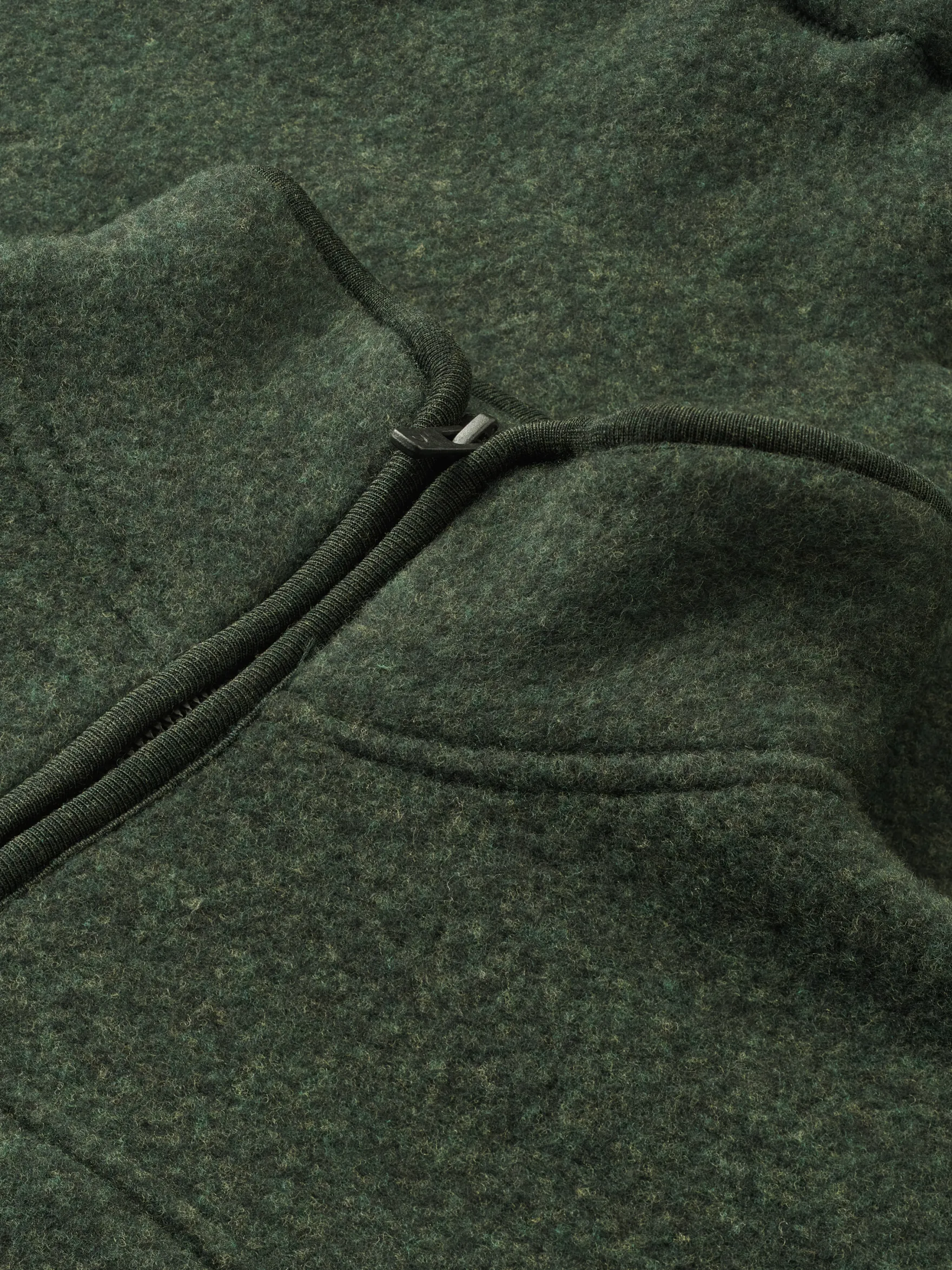 Half-zip-jakke i merinouldfleece til kvinder