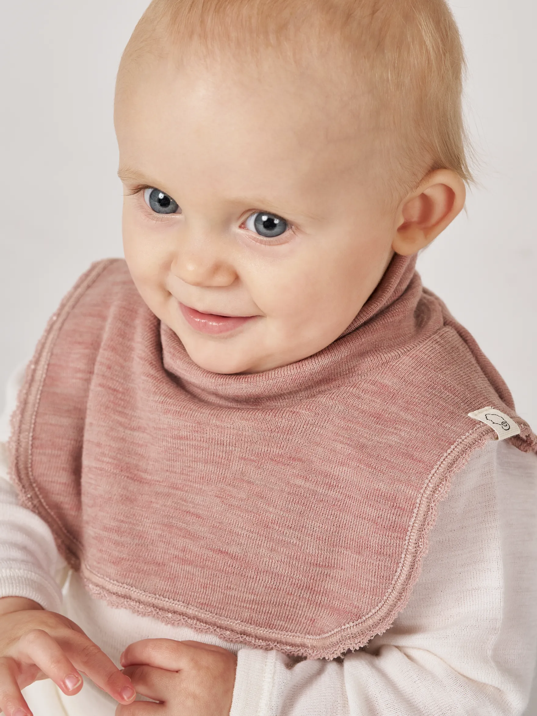 Halsedisse i merinould til baby