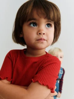 Kjole med korte ærmer i merinould til baby