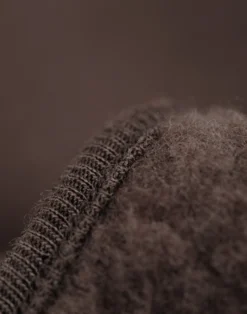 Køredragt med hætte i merinouldfleece til baby