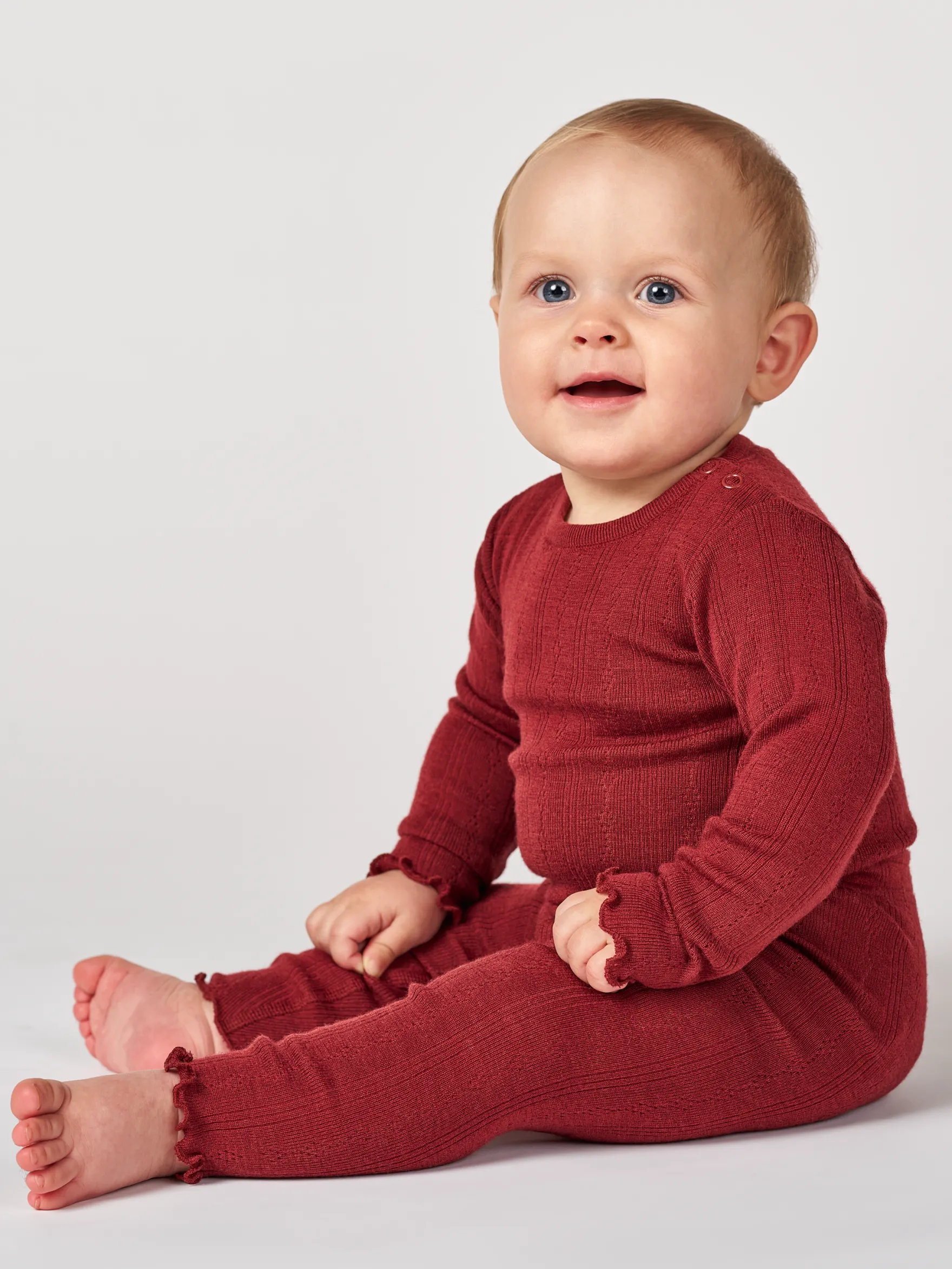 Leggings i merinould med hulmønster til baby