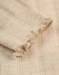 Leggings i merinould med hulmønster til baby