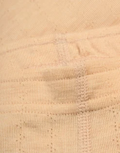Leggings med hulmønster i merinould/silke til baby