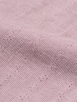 Leggings med hulmønster i merinould/silke til baby