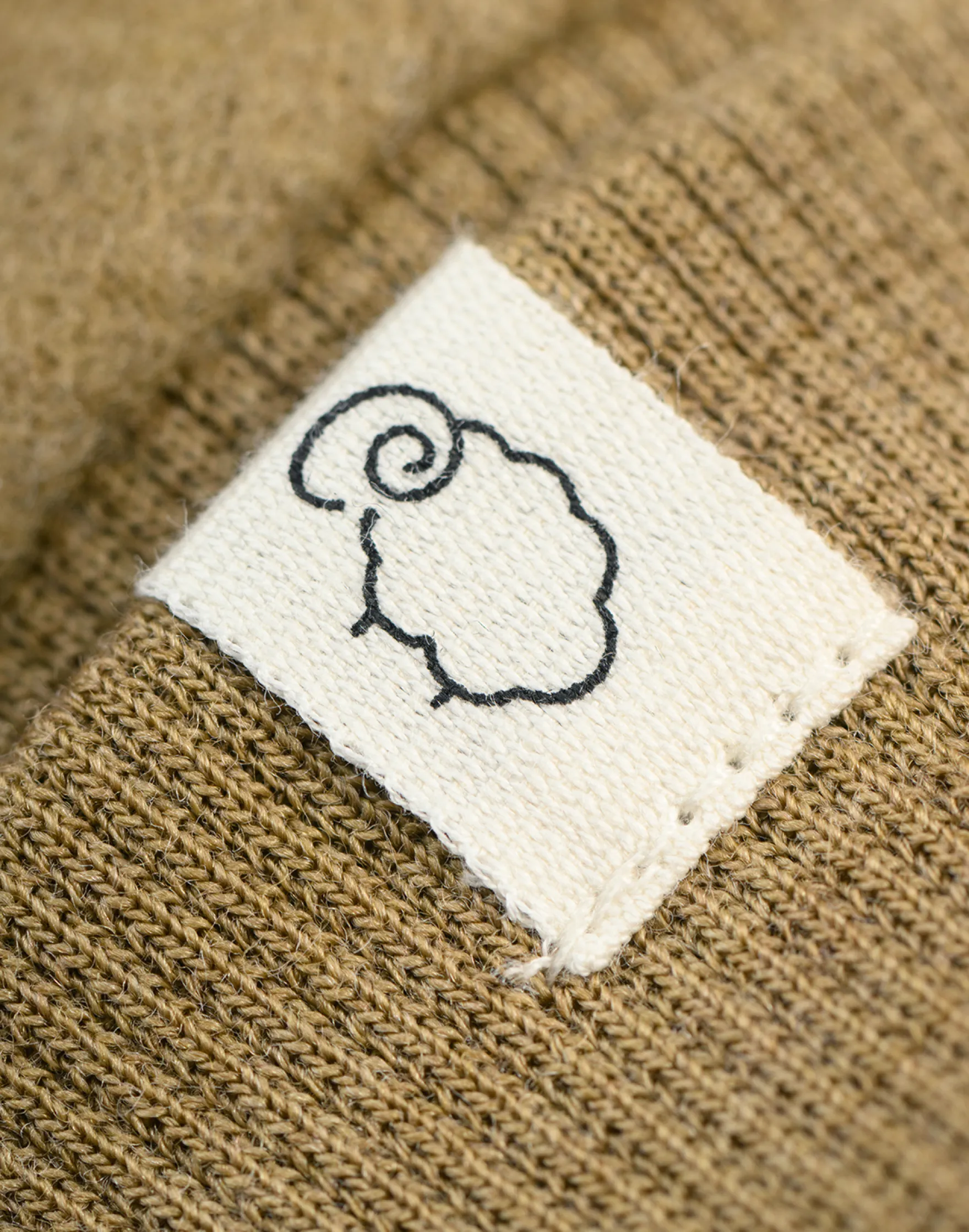 Luffer i merinouldfleece til baby