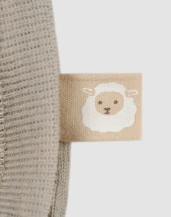 Slå-om body med lange ærmer i merinould til baby