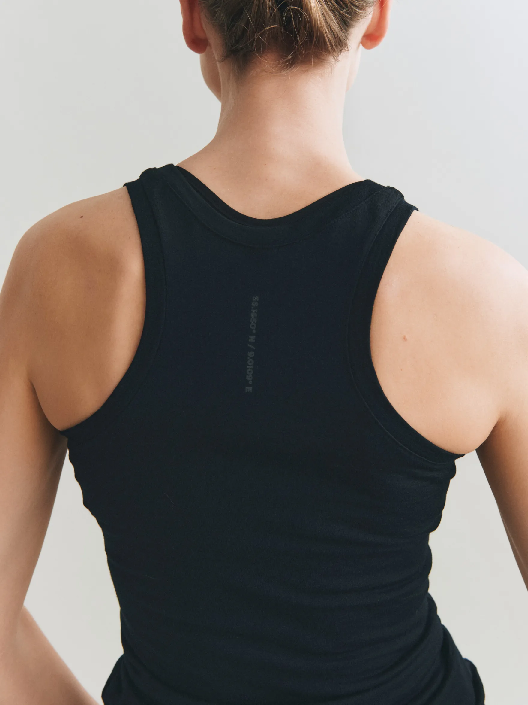Tank top med bryderryg i merinould til kvinder