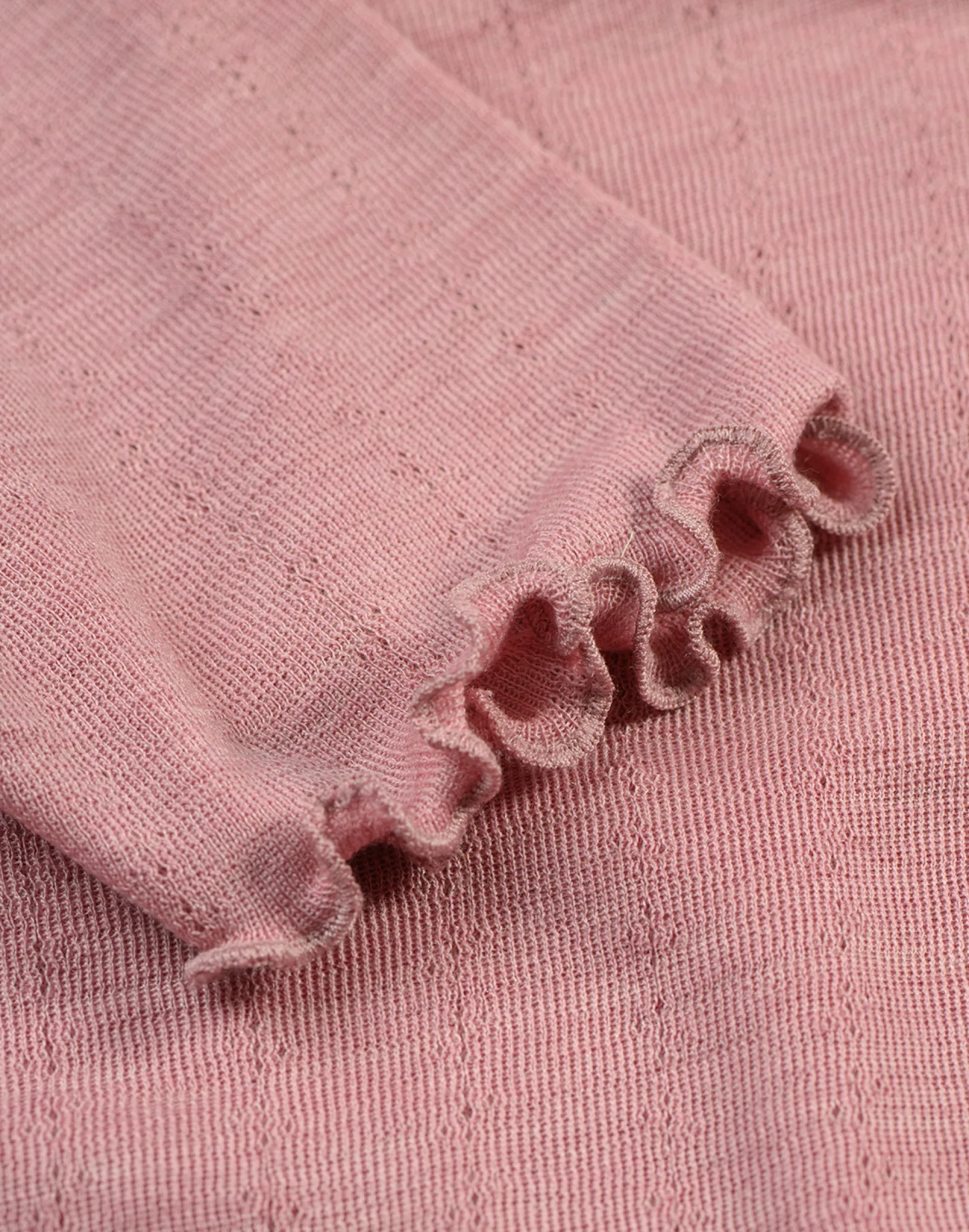 T-shirt med hulmønster i merinould/silke til børn